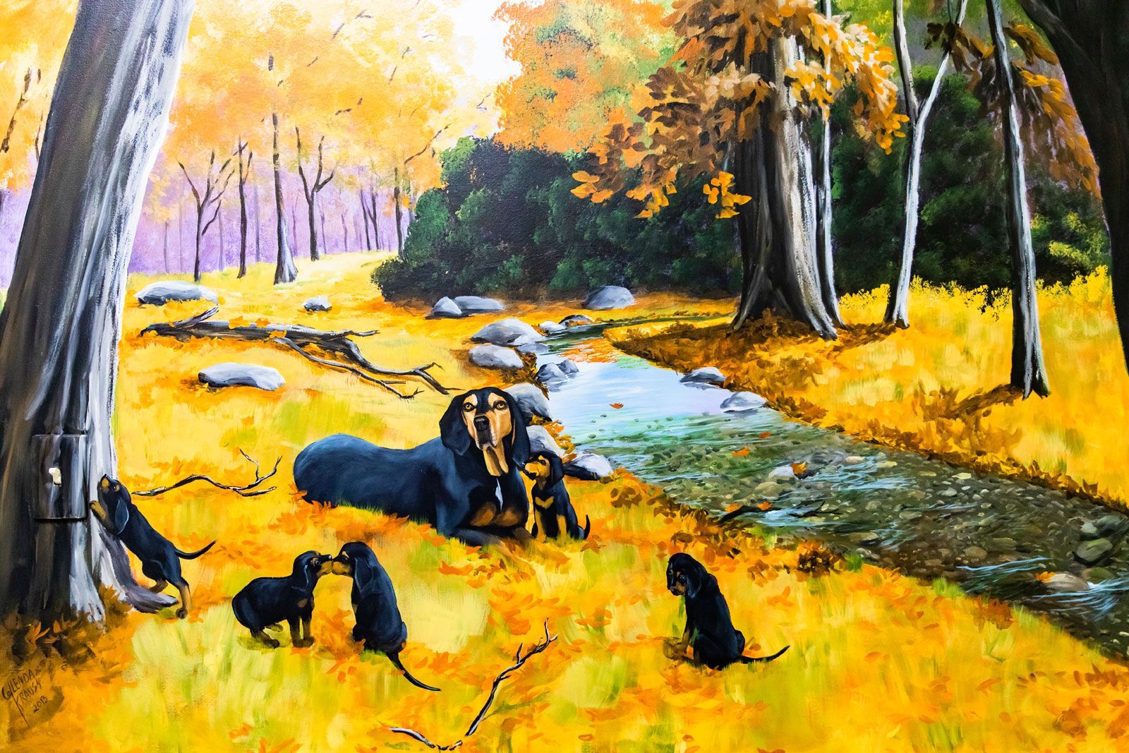 A painting of a group of dogs standing next to a river in the woods.