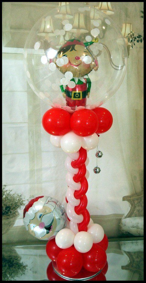 Balloon Elf  in a snow bubble table top centre piece