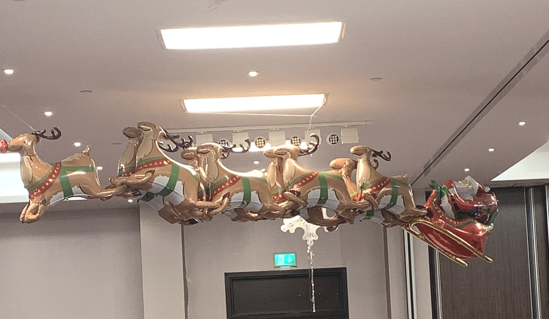 flying Santa in his sleigh balloons