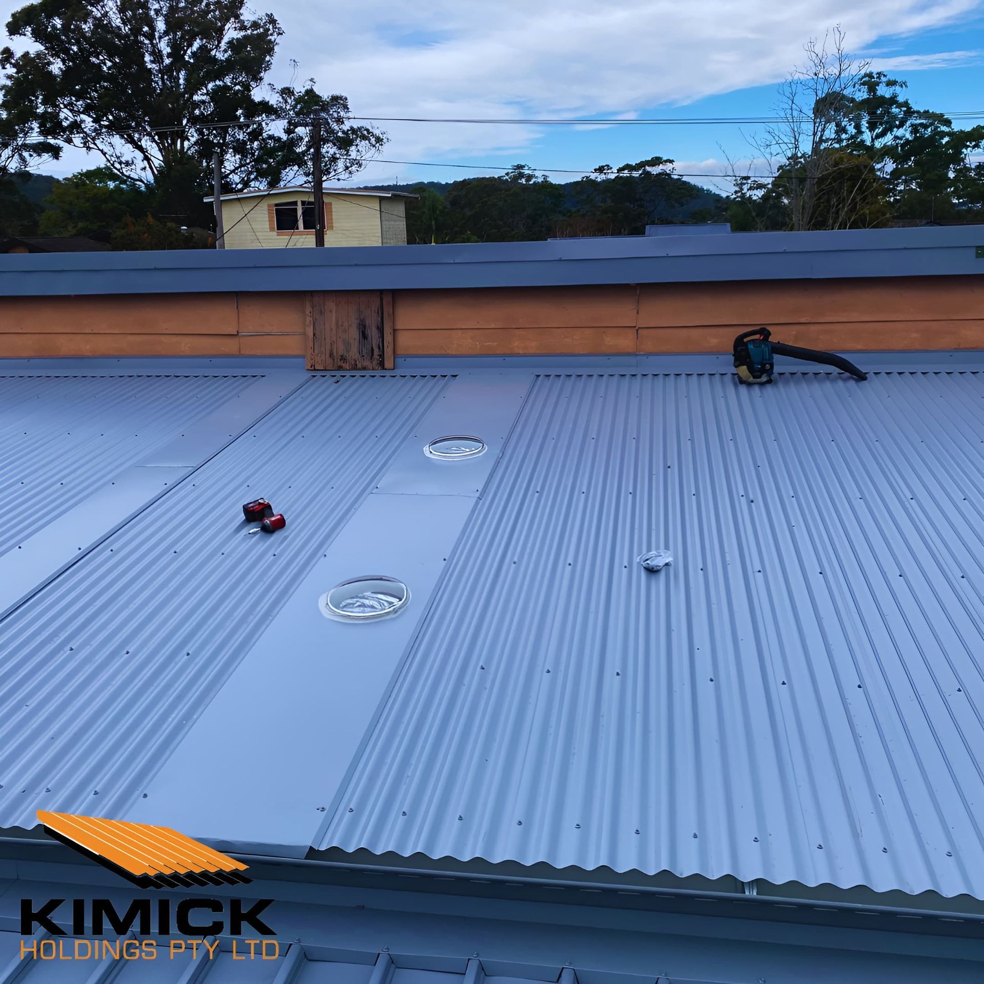 A Close Up Of A Dark Grey Roof — Kimick Roofing Solutions In Fortitude Valley, QLD