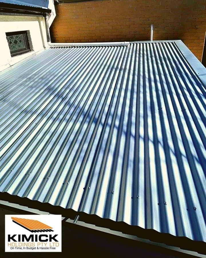 A Close Up Of A Metal Roof On A Building — Kimick Roofing Solutions In Wyong, NSW