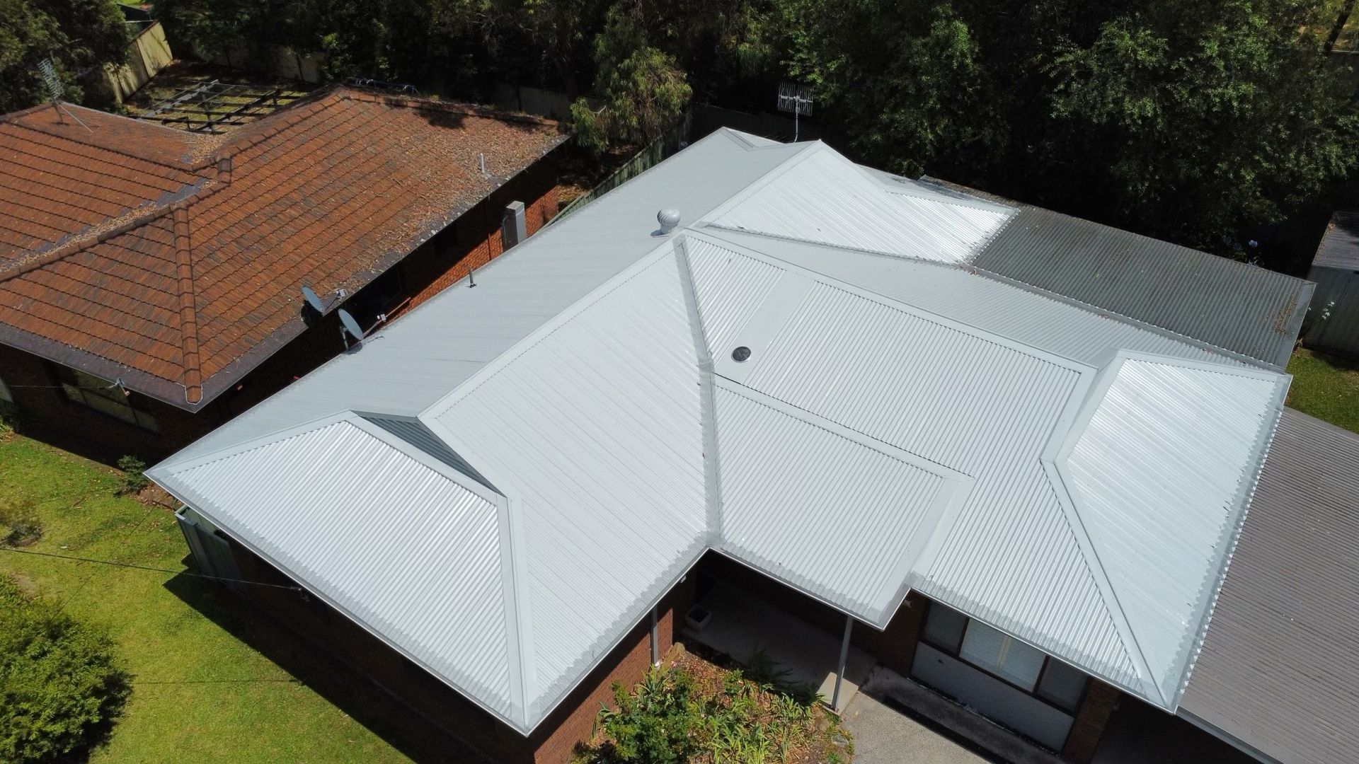 A House With A Metal Roof  — Kimick Roofing Solutions In Wyong, NSW