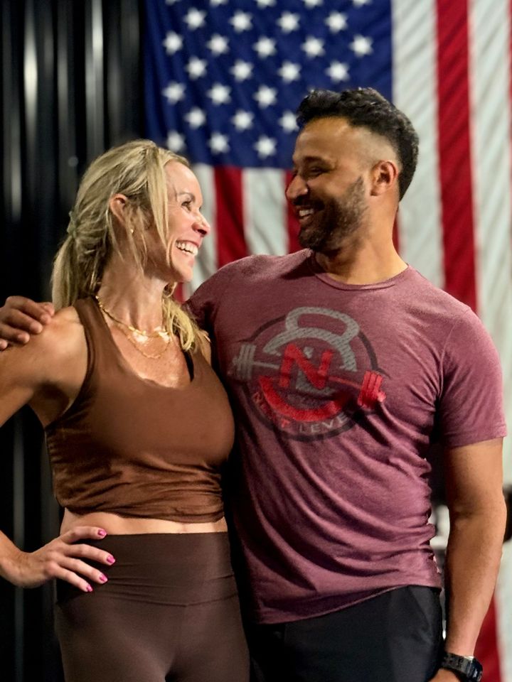 A man and a woman are standing next to each other