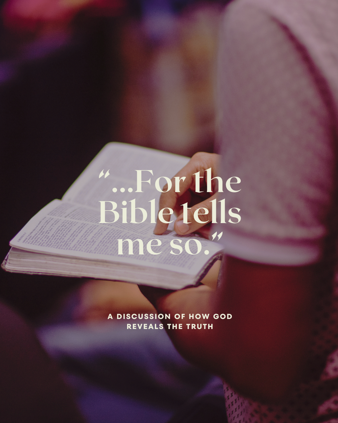 A person holding a bible that says 