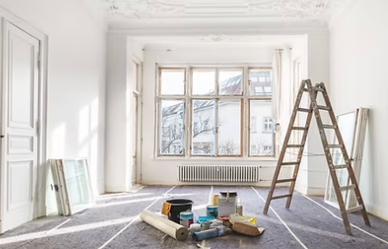 Hands in a circle, fists bumping together in a sign of teamwork or solidarity.