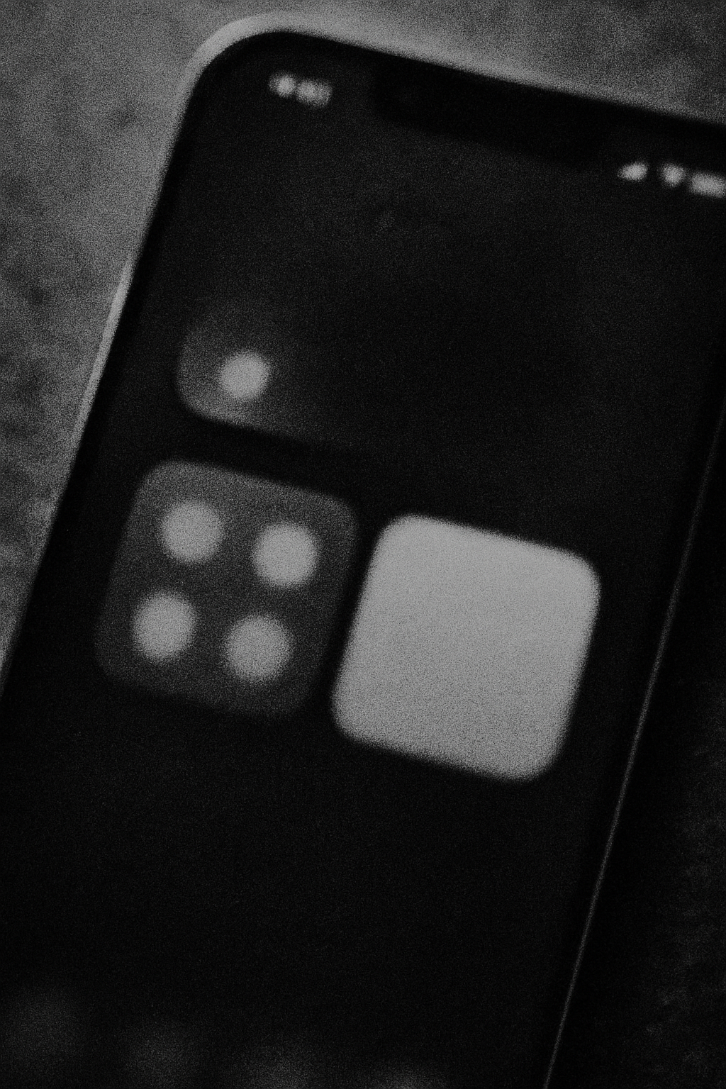 “Black-and-white close-up of a smartphone interface representing AI search and generative engine interaction.”