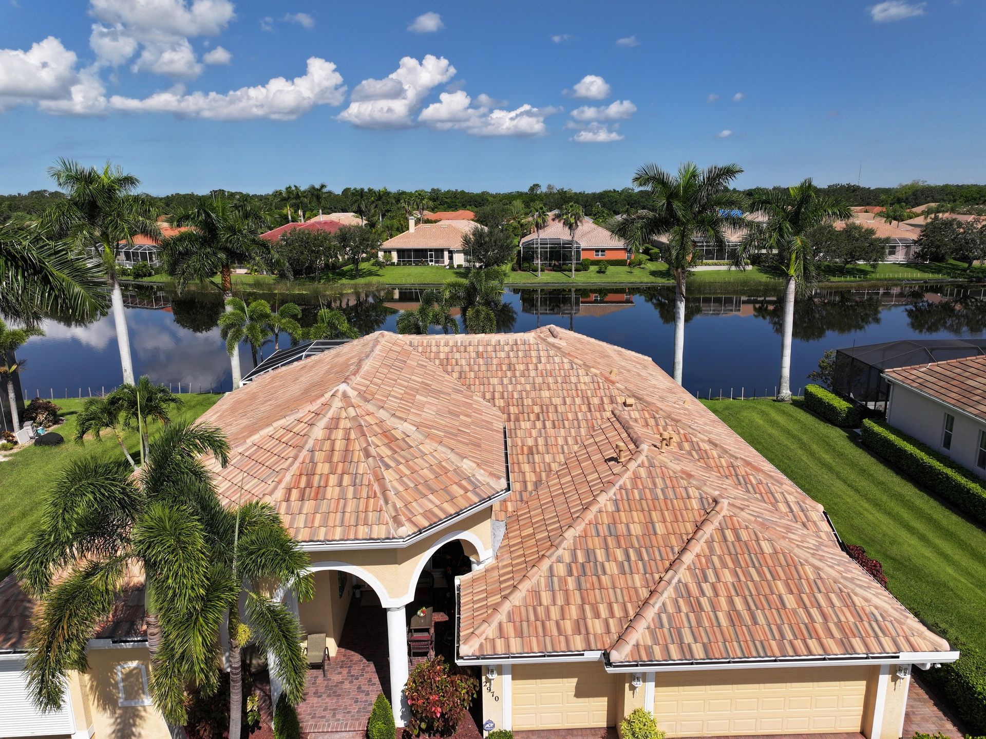 An aerial view of a house with a tiled roof