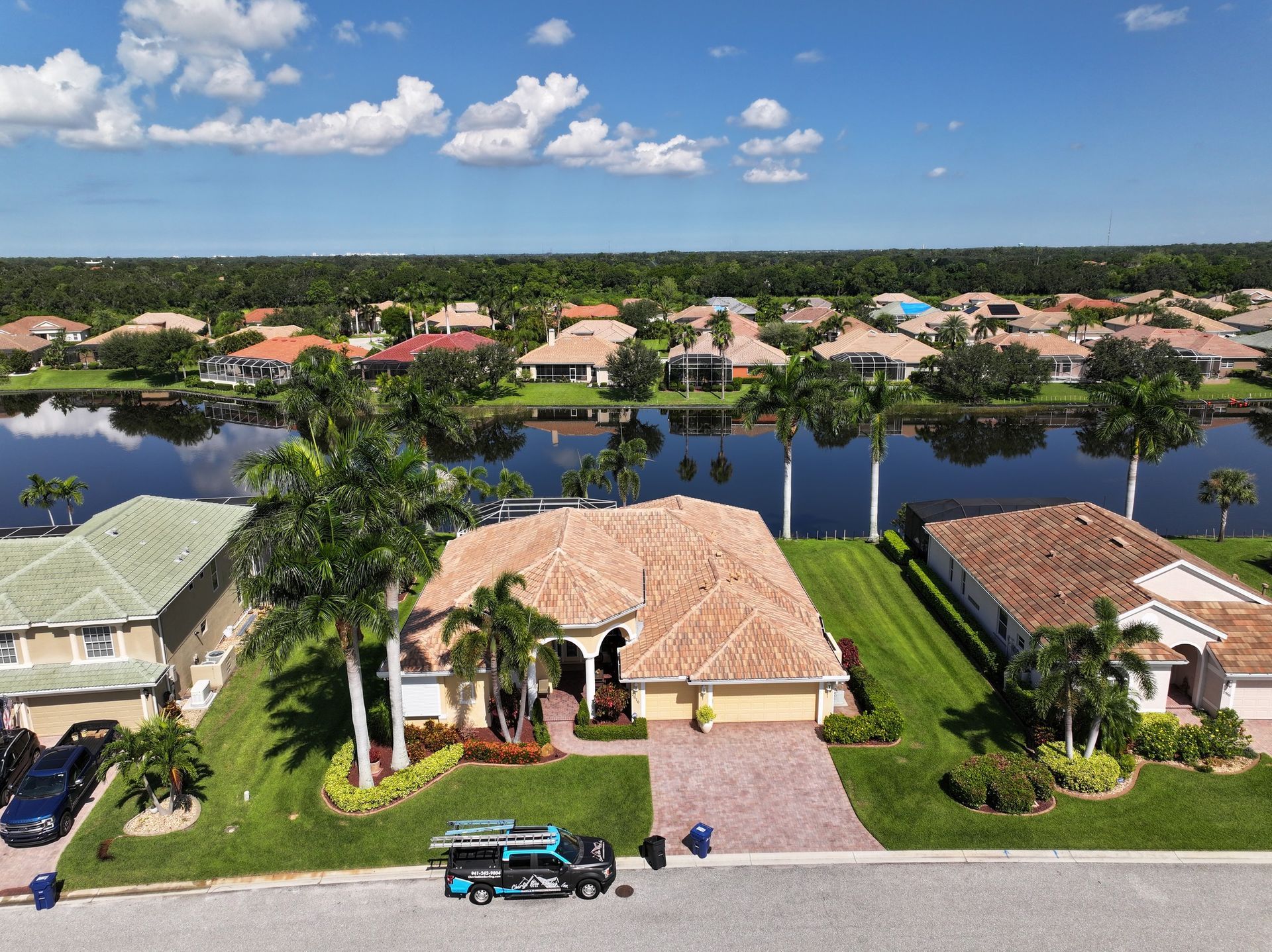 An aerial view of a house in a residential area