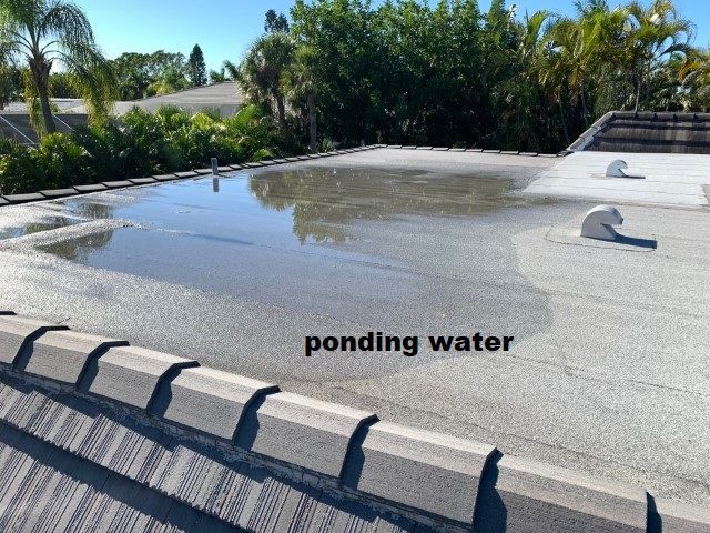 Old Roofing Shingles and Gutter — Lakewood Ranch, FL — Charlie Rice Roofing, Inc.