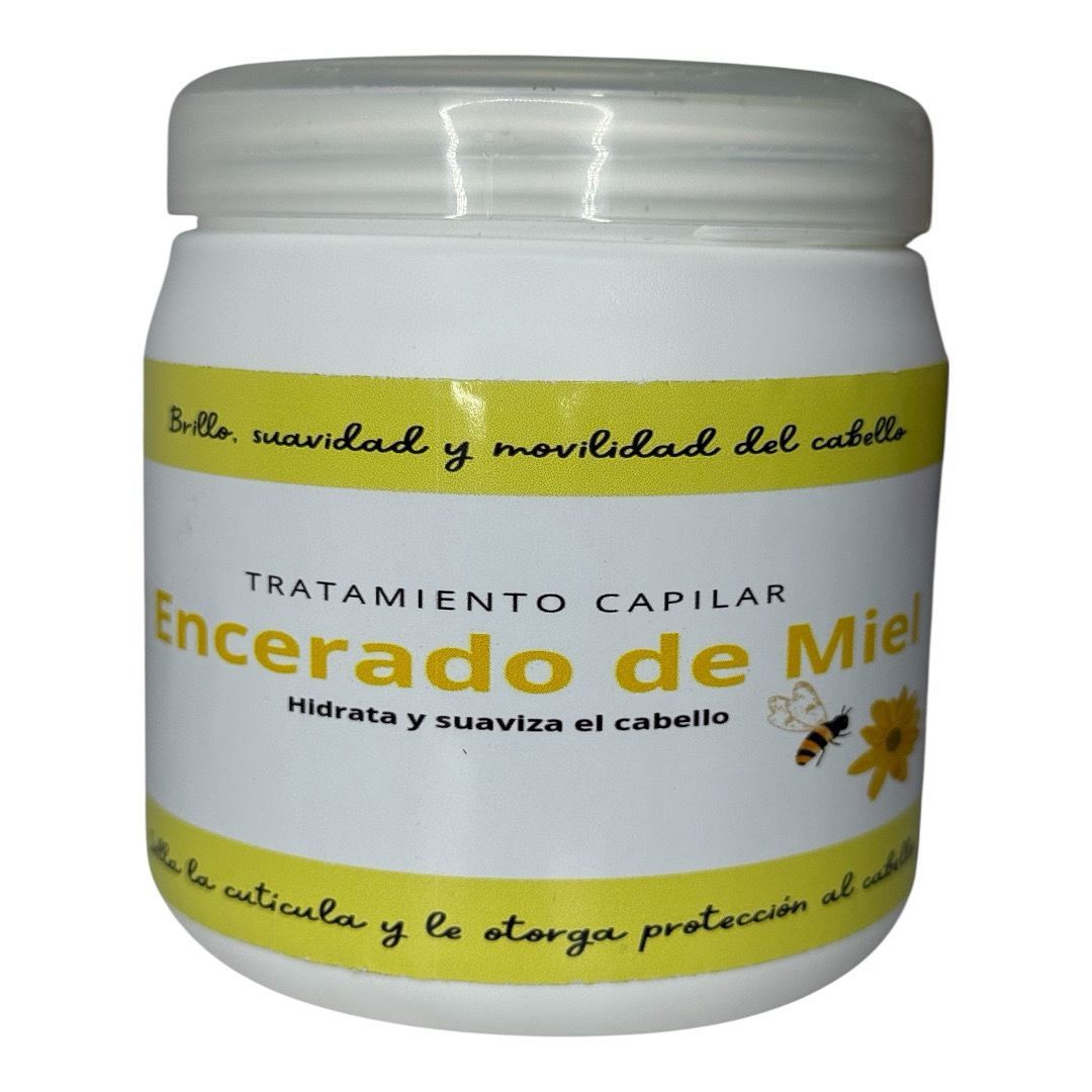 Tarro blanco de tratamiento capilar “Encerado de Miel” con texto en amarillo.
