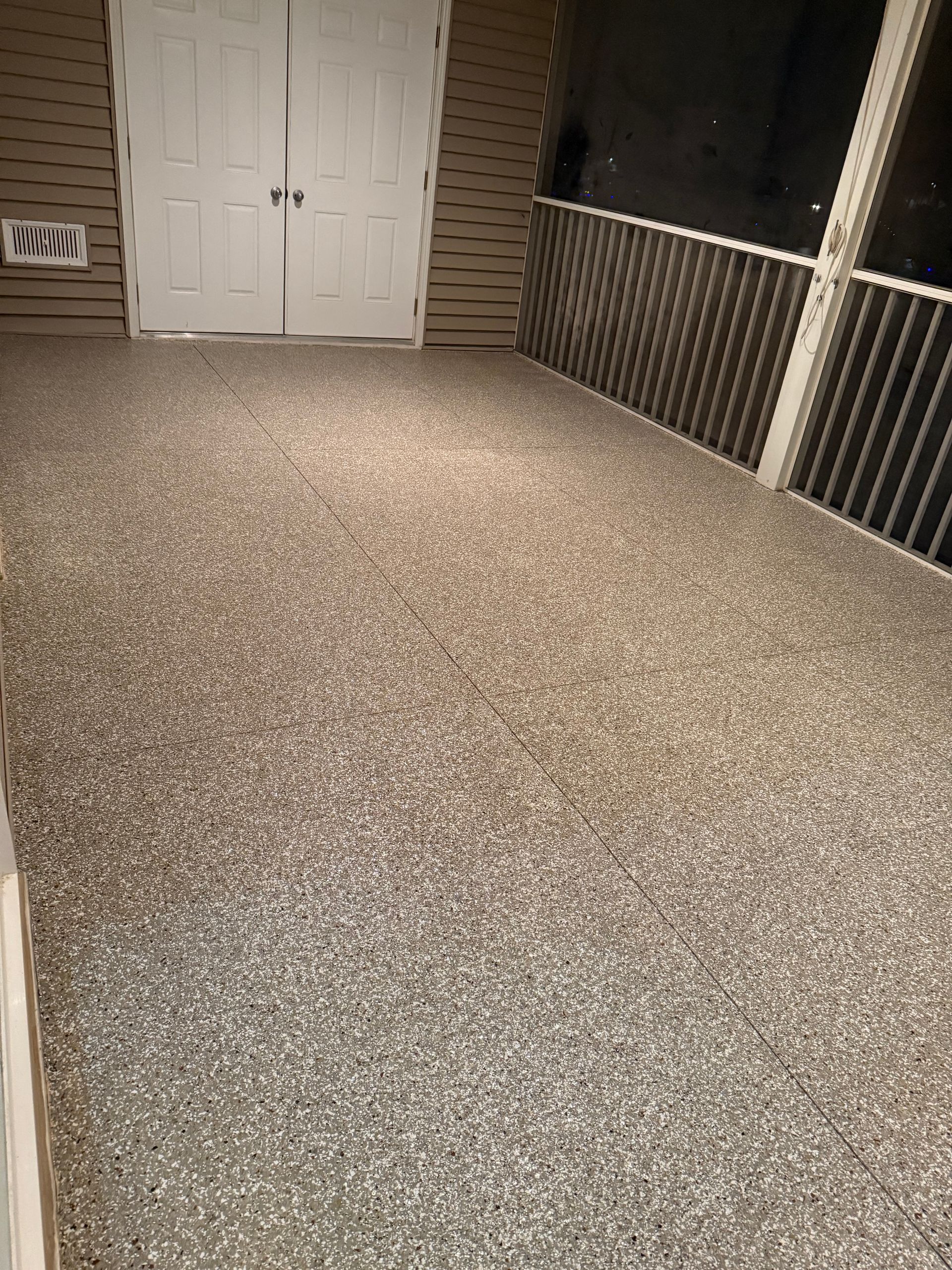 Fixed back porch concrete finish, and scraped off glue