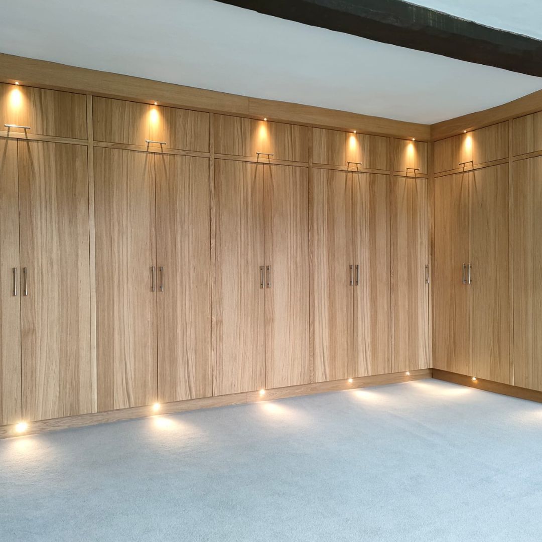 A large room with a lot of wooden cabinets