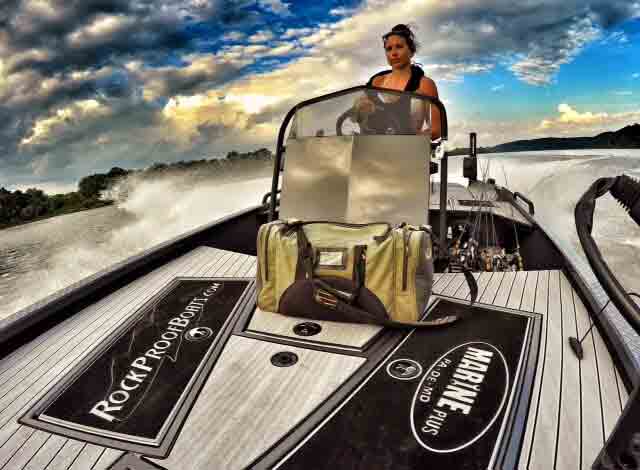 A Woman Driving a Marine Boat — Lancaster, PA — Marine Plus LLC