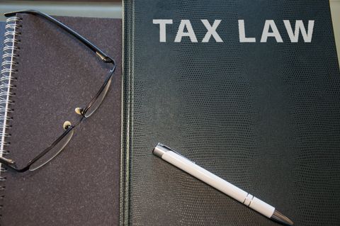 Elder Law in AR — Taxt Law Book With Pen on Top in Little Rock, AR