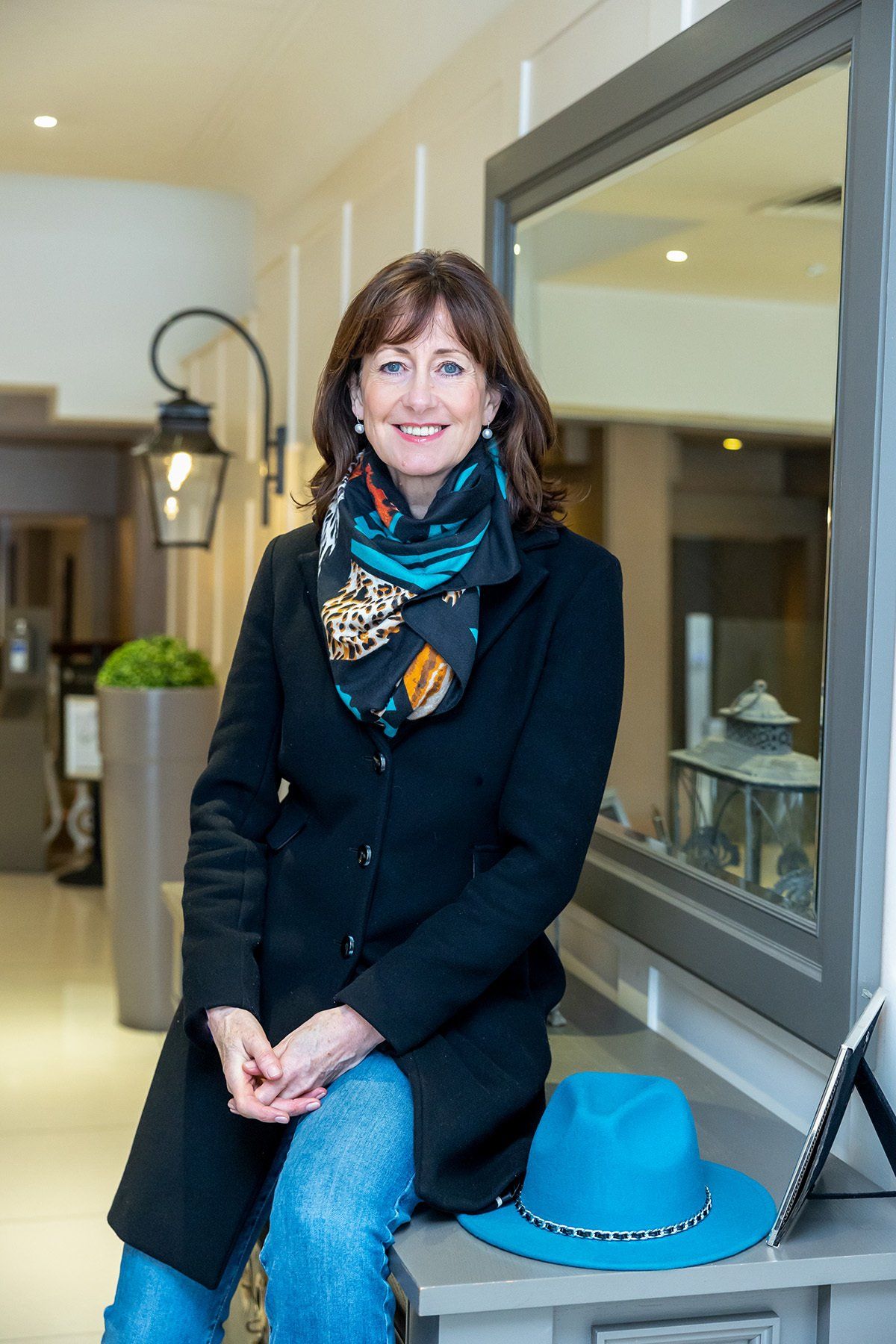 Commercial photographer reading, female headshot