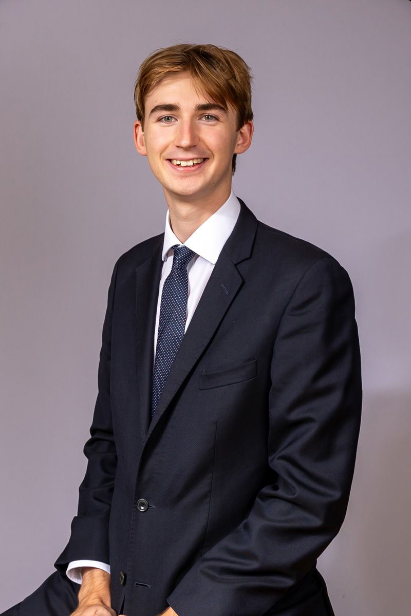 Headshot photographer Berkshire, male student grey background