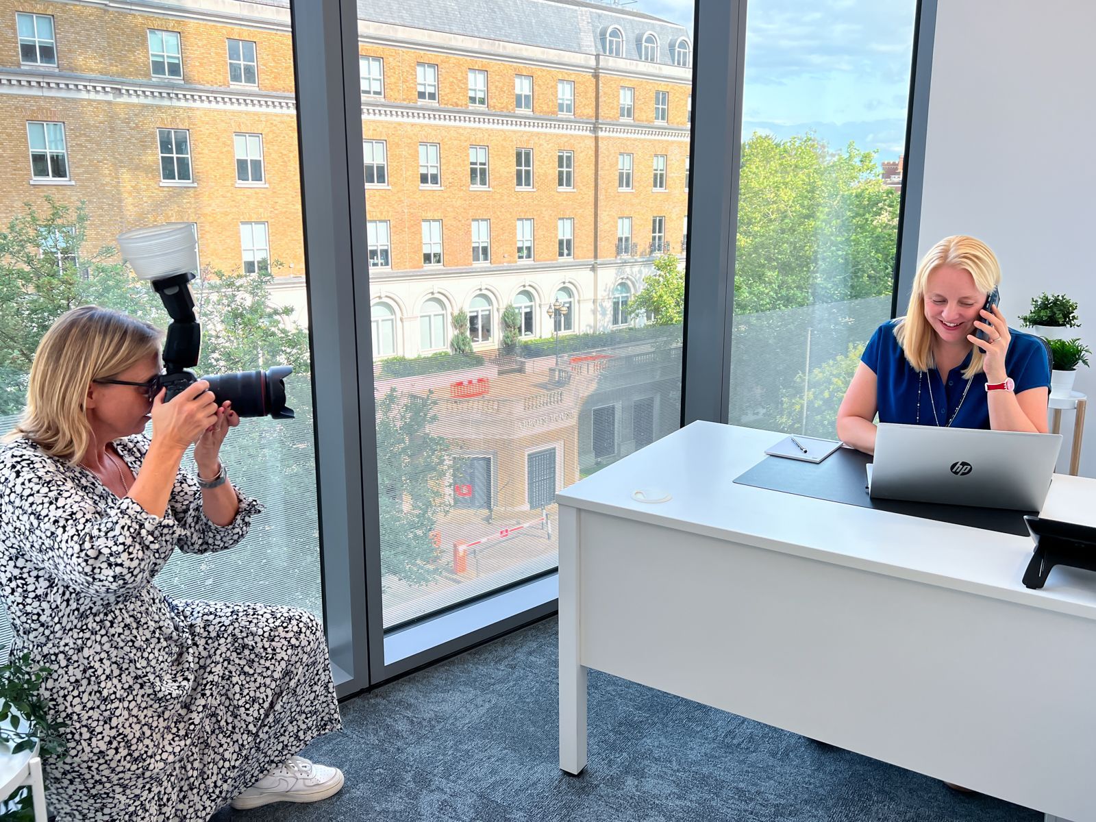 Professional photographer near me, taking photos of female exec