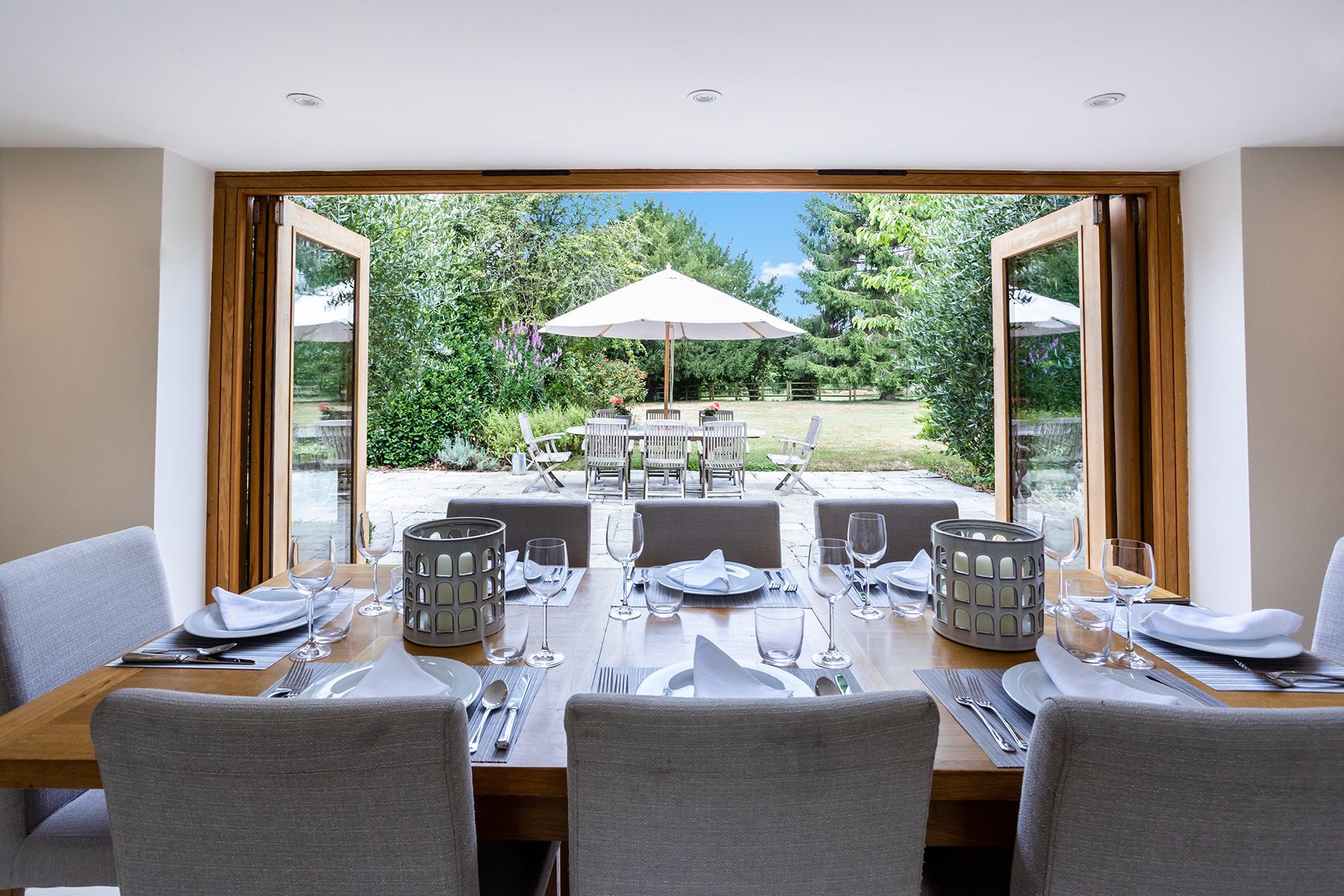 property photography berkshire, view to outside garden from beautifully laid table