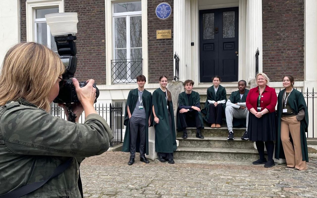 event photographer reading, photographer taking images of prefects at school