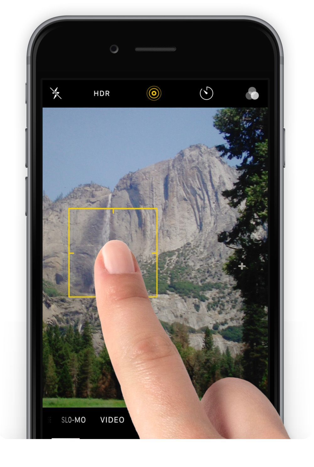 professional photographer reading, adjusting exposure on iphone photo