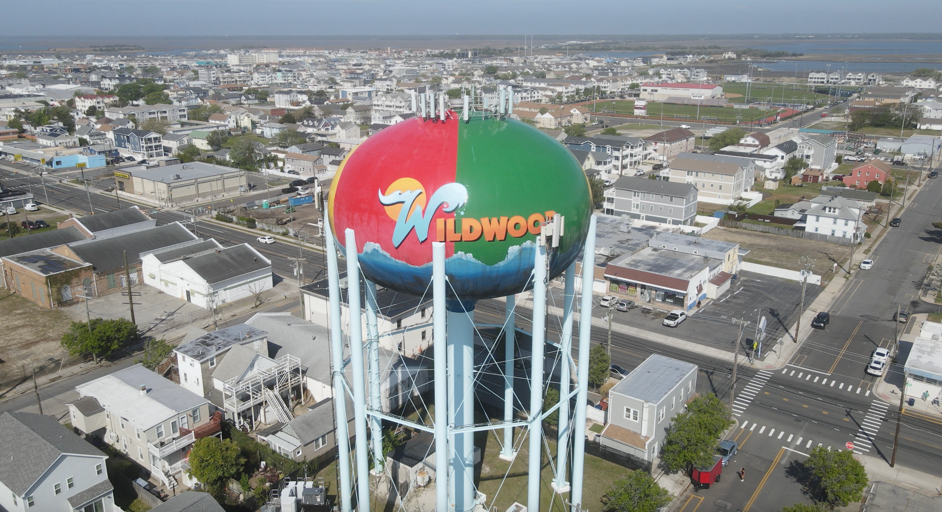 An aerial view of a water tower in a city