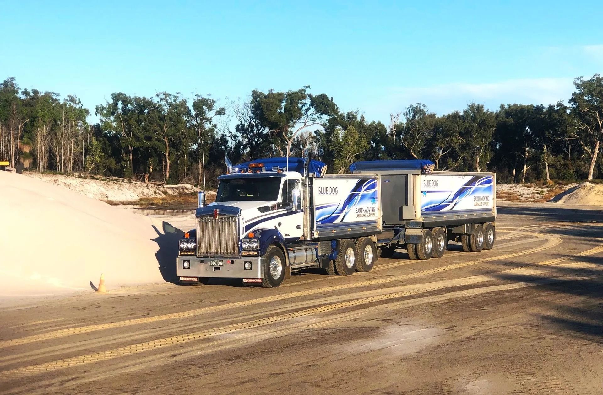 Blue and White Semi-truck on a Dirt Road — Blue Dog Earthmoving Landscape Supplies in Nambucca Heads, NSW