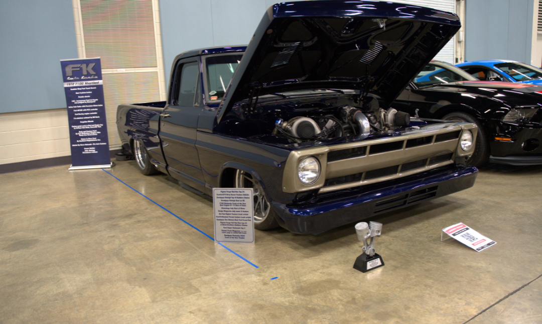 Antique truck with raised hood