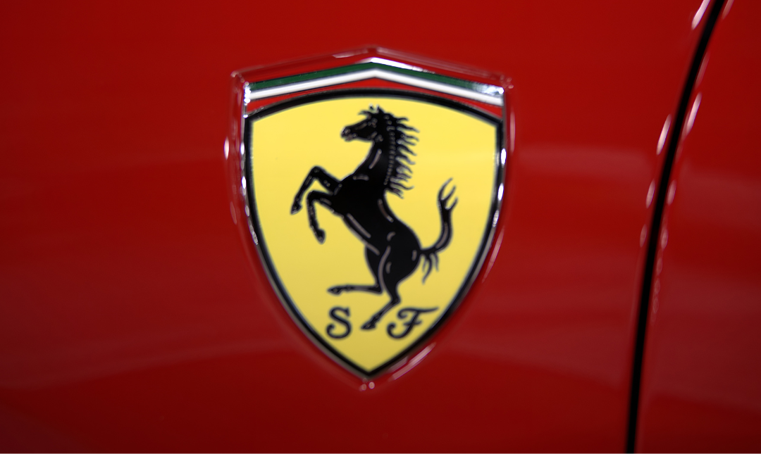 Detail of Ferrari nameplate on red car