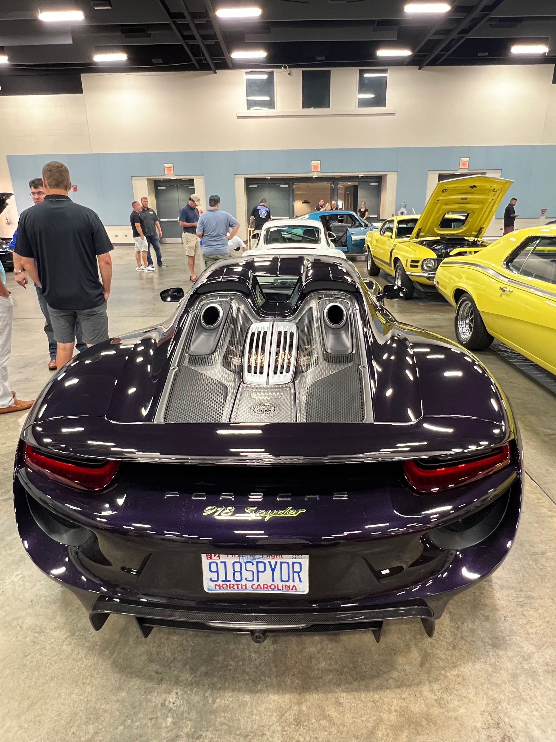 Rear view of shiny purple Porsche Spyder 