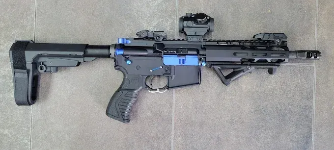 A photo of black and blue gun