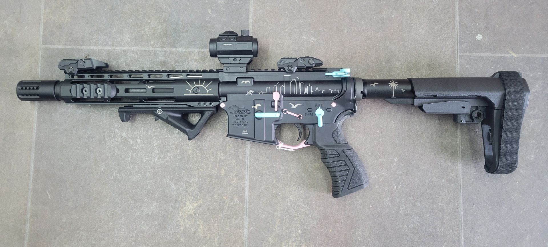 A photo of gun withn desig on it