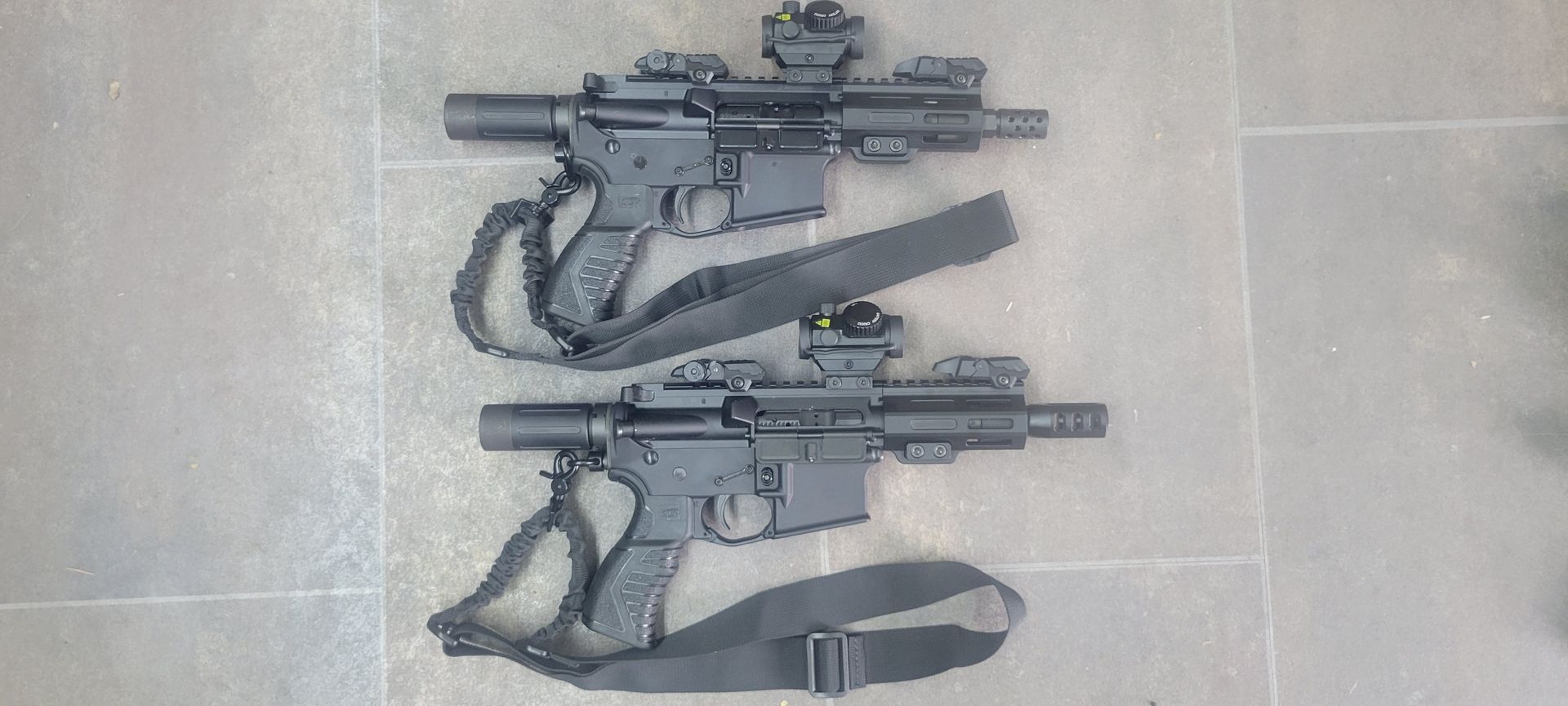 A photo of two black gun 