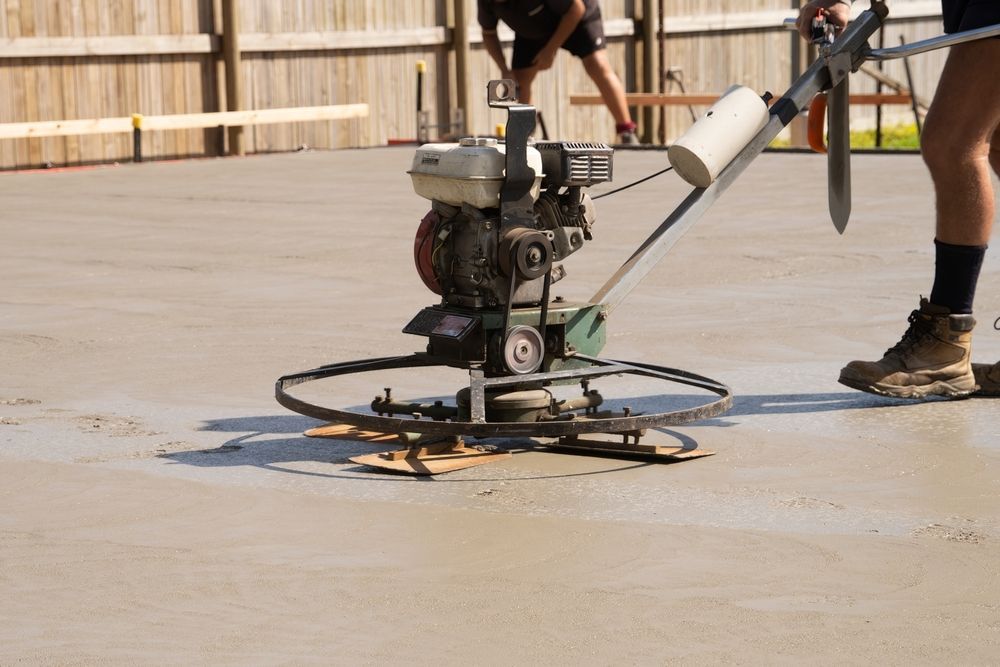 Concrete Floor Being Smoothed — Northern Rivers Concrete Construction in Casino, NSW
