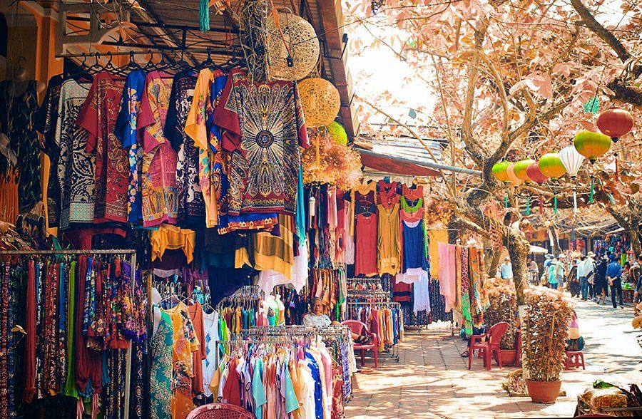 bazaar with brightly colored clothes