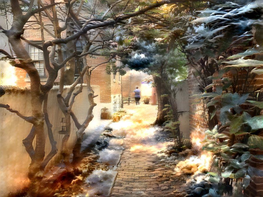 an alley in a city with plants and small trees