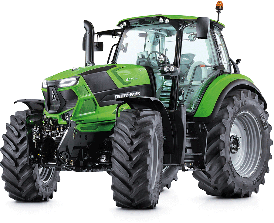 Green Deutz-Fahr tractor with black accents and large tires, in a field, on a sunny day.