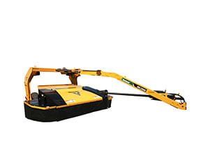 Yellow flail mower attached to a tractor; for cutting roadside brush.