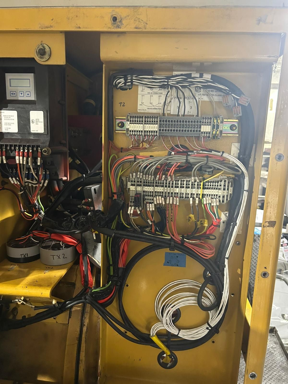 A Large Generator on a Trailer Parked Next to a Concrete Wall — KAC Generation & Mechanical Pty Ltd In Bungalow, QLD