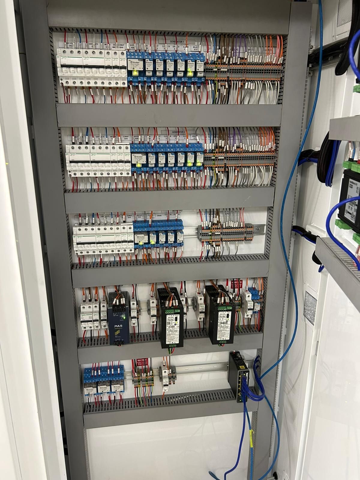 Three White Solar Inverters Mounted With Electrical Conduit — KAC Generation & Mechanical Pty Ltd In Bungalow, QLD