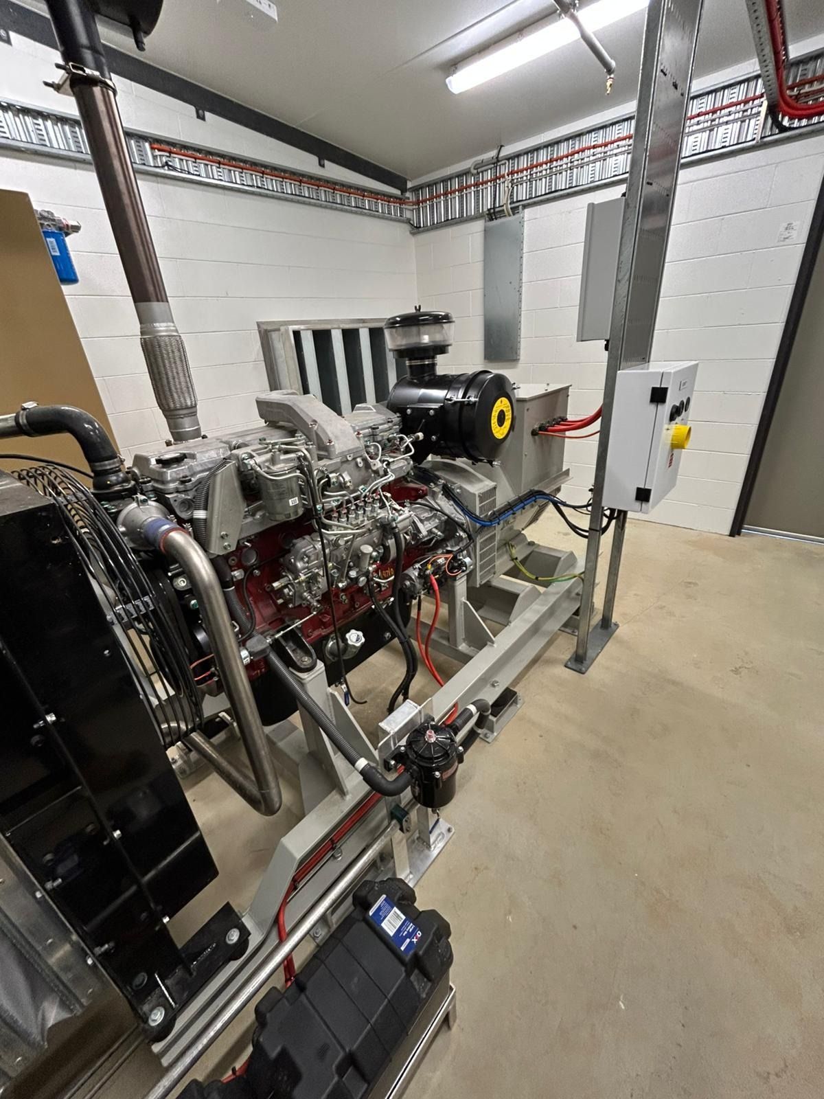 Workers Assembling an Electric Car Battery Pack — KAC Generation & Mechanical Pty Ltd In Bungalow, QLD