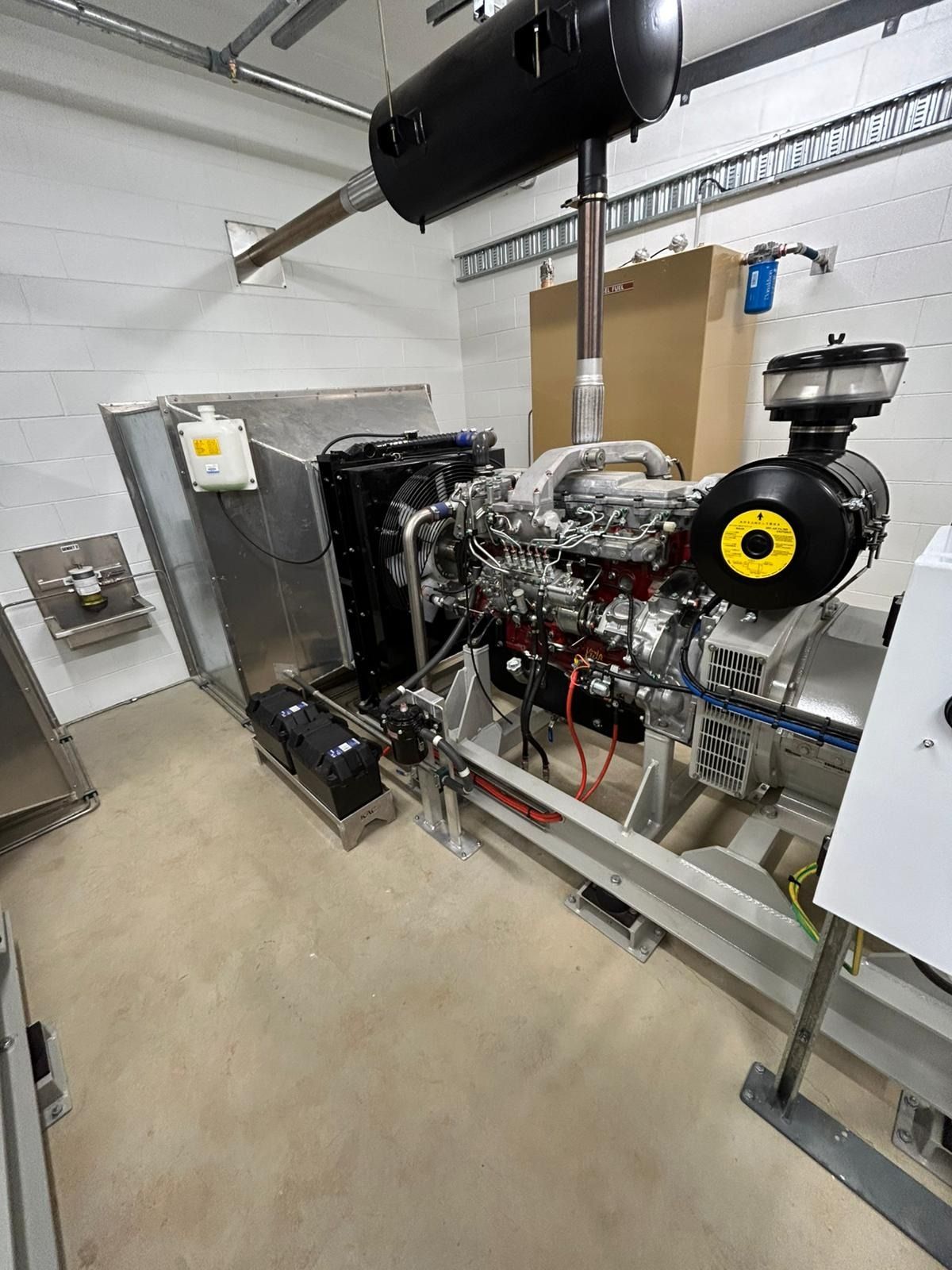 Hands Wearing Gloves Using a Multimeter to Test — KAC Generation & Mechanical Pty Ltd In Bungalow, QLD