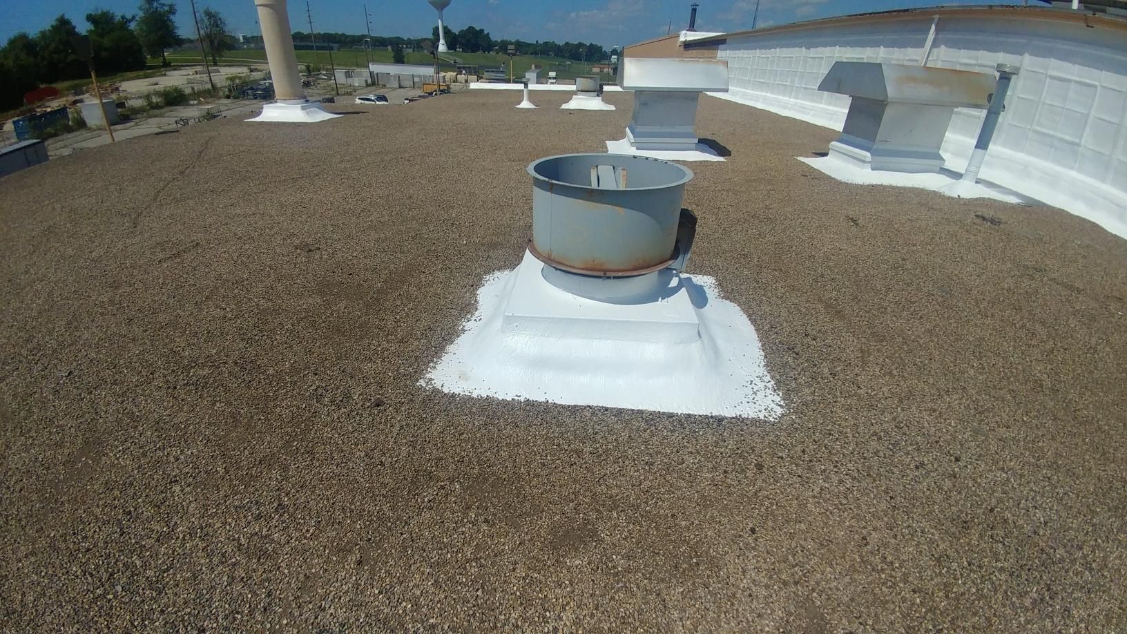 A roof with a chimney on top of it