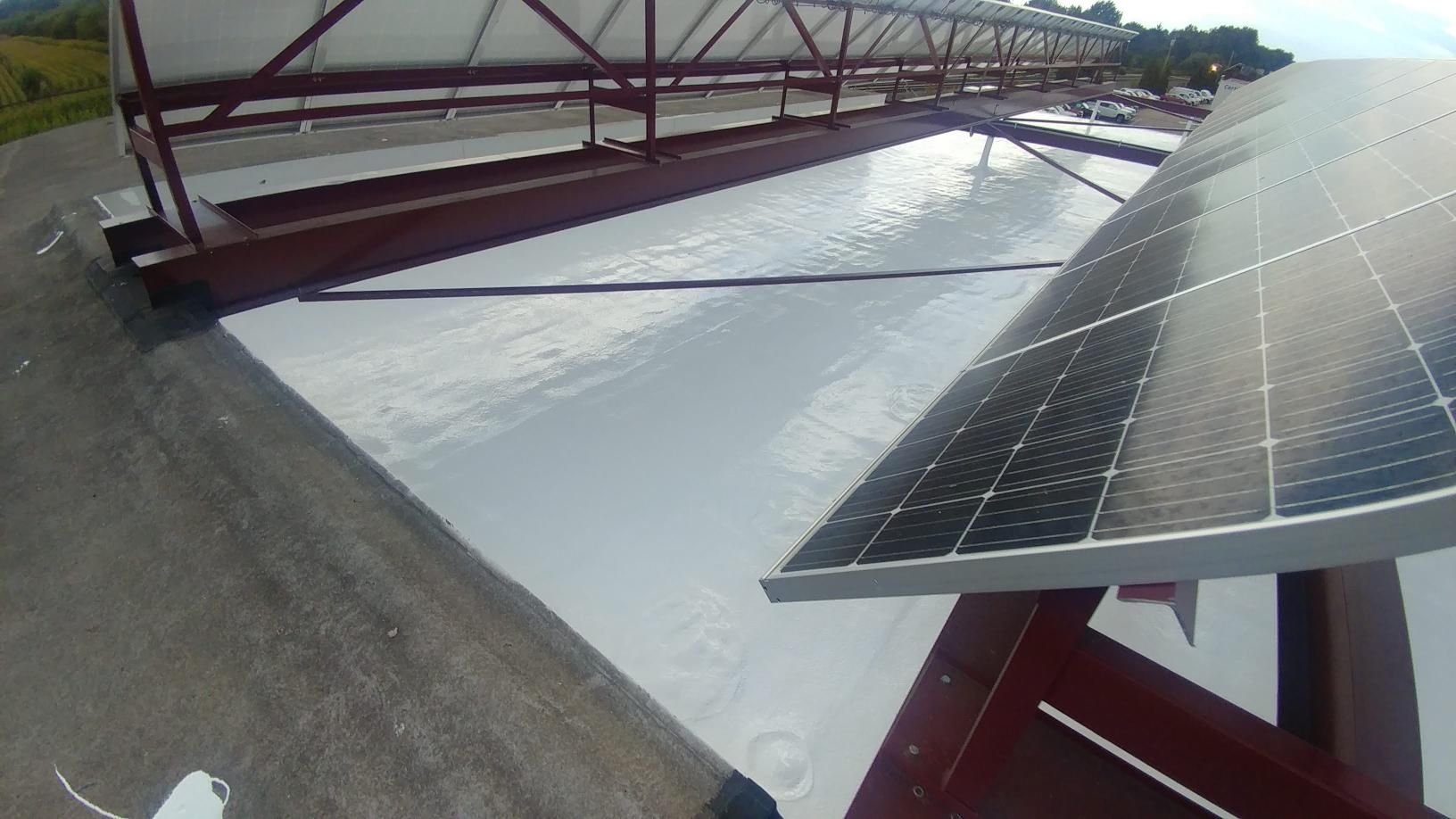 A solar panel is sitting on top of a building