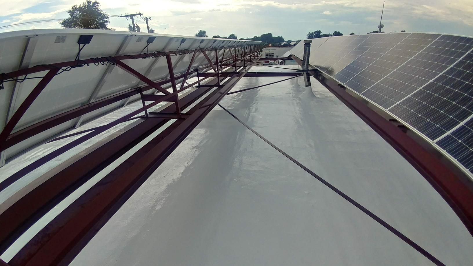 A roof with a lot of solar panels on it