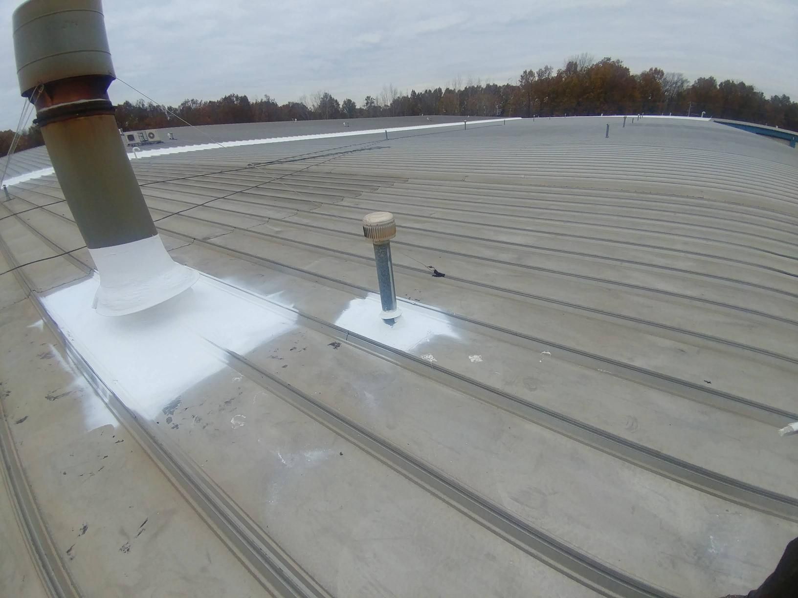 A roof with a chimney on top of it