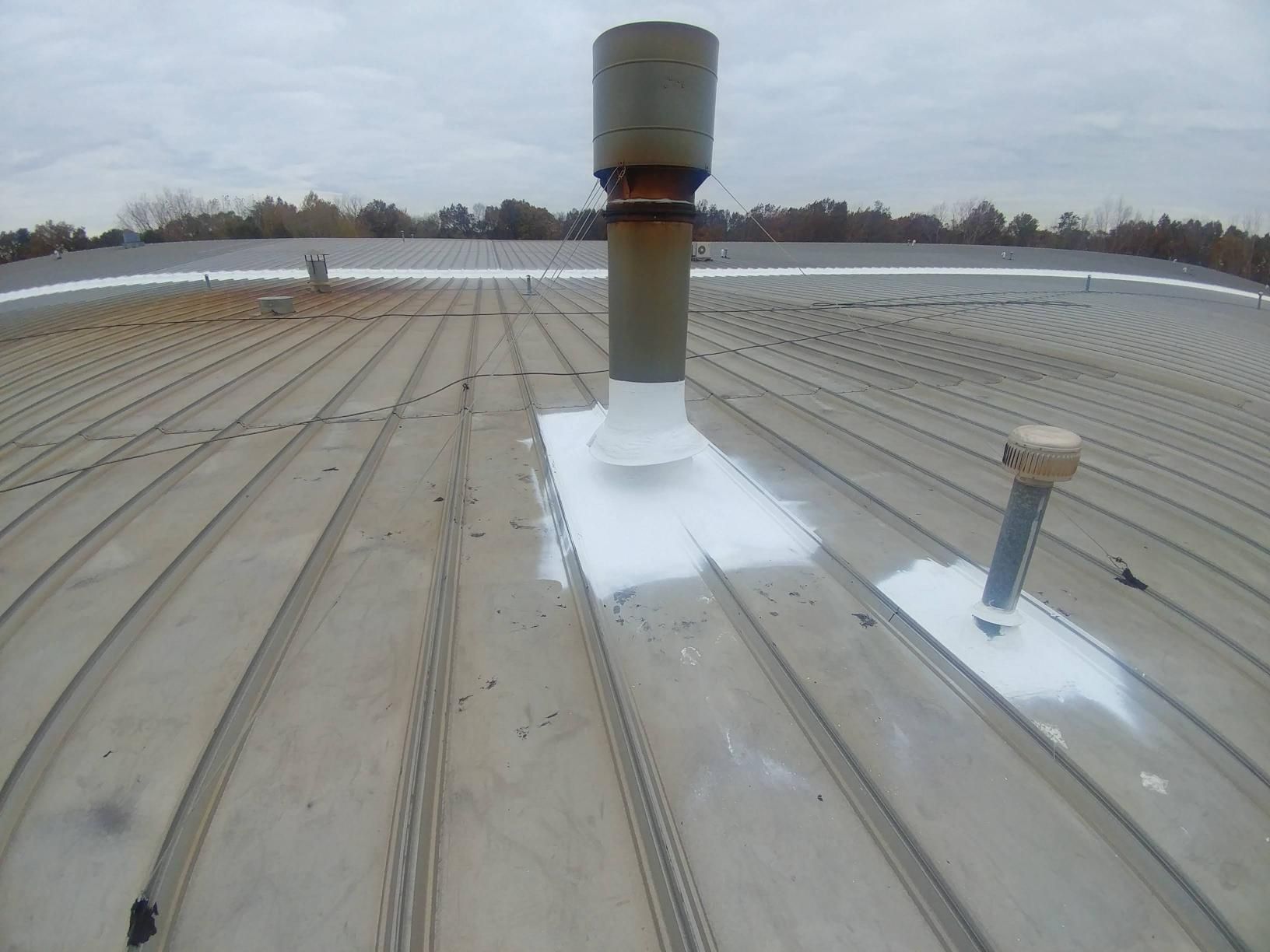 A roof with a chimney on top of it