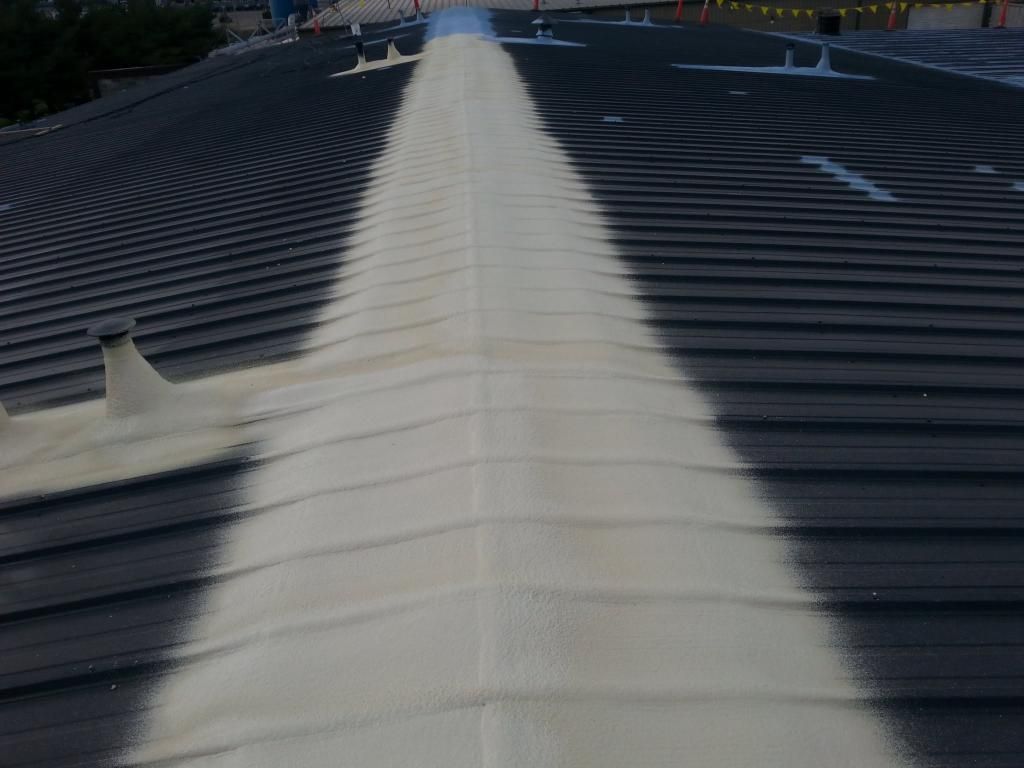 A white line is painted on the roof of a building.