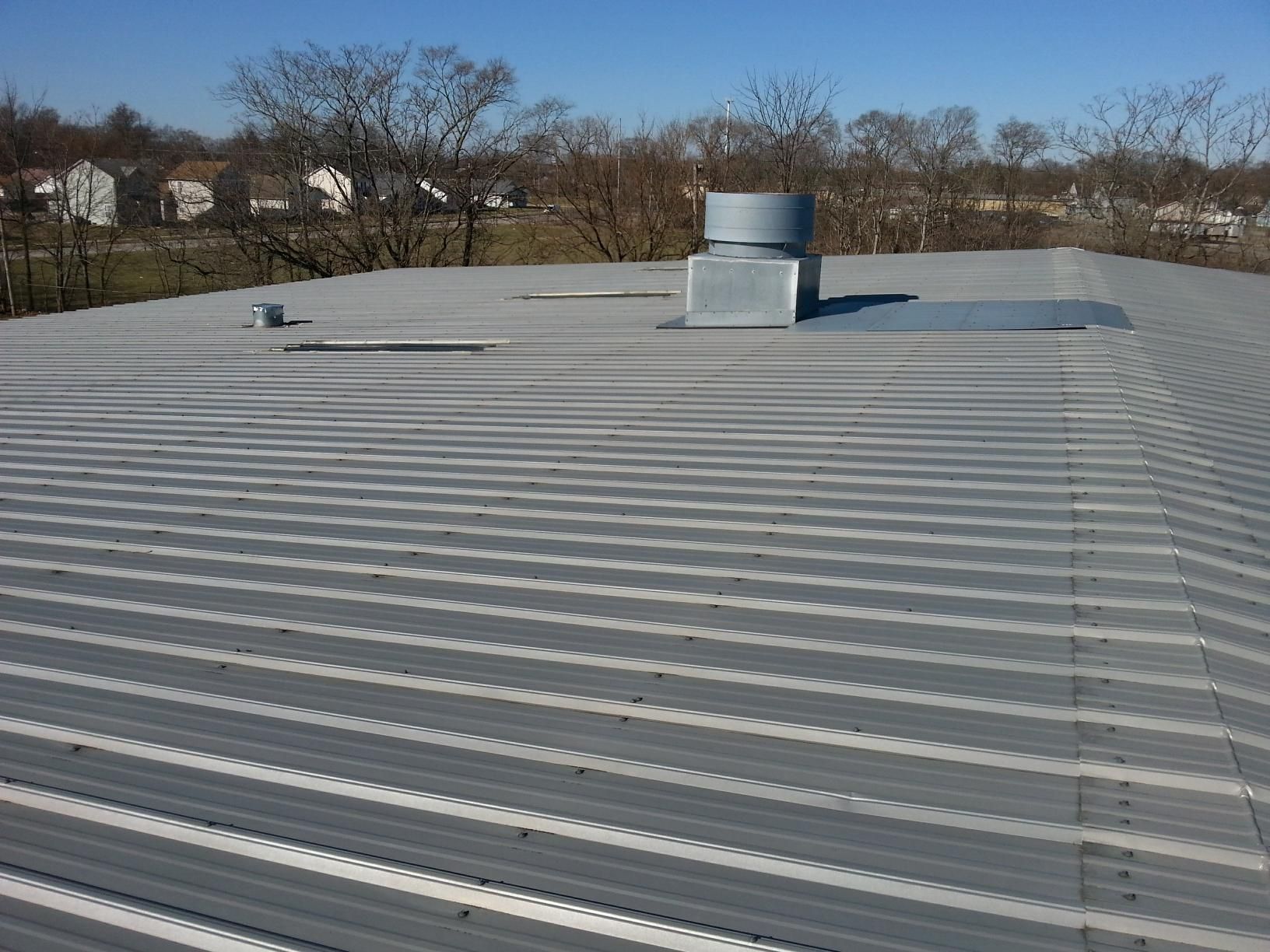 A roof with a chimney on top of it