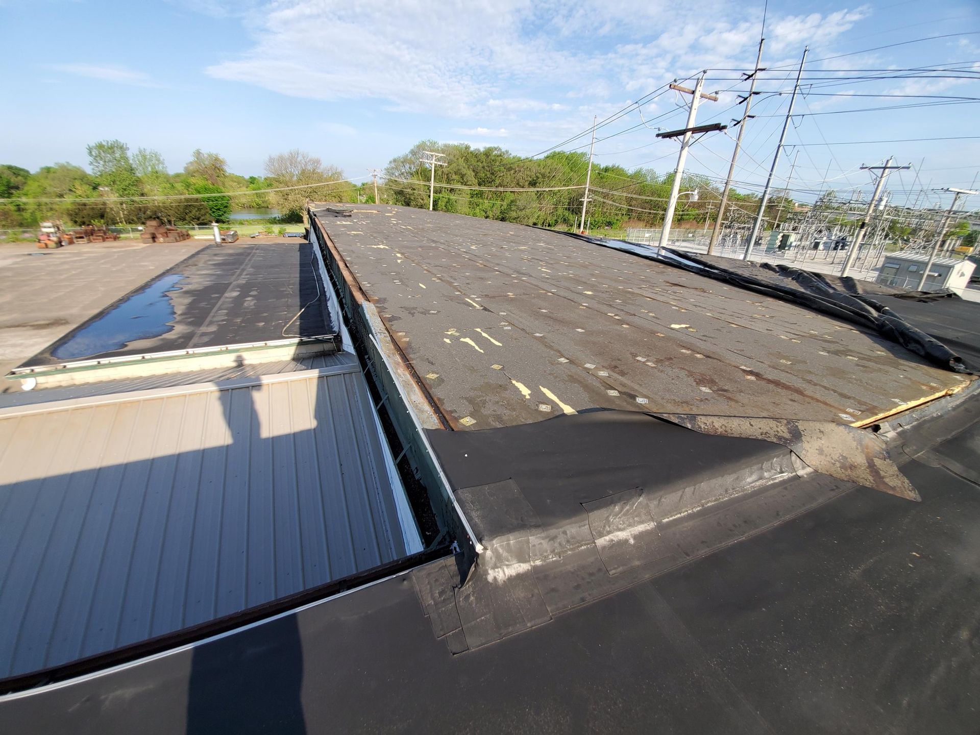 The roof of a building with a drain on it