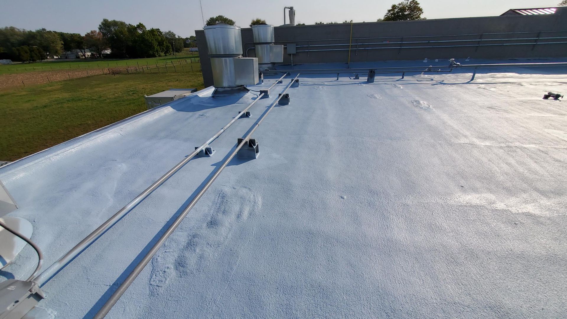 A roof with a lot of wires on it